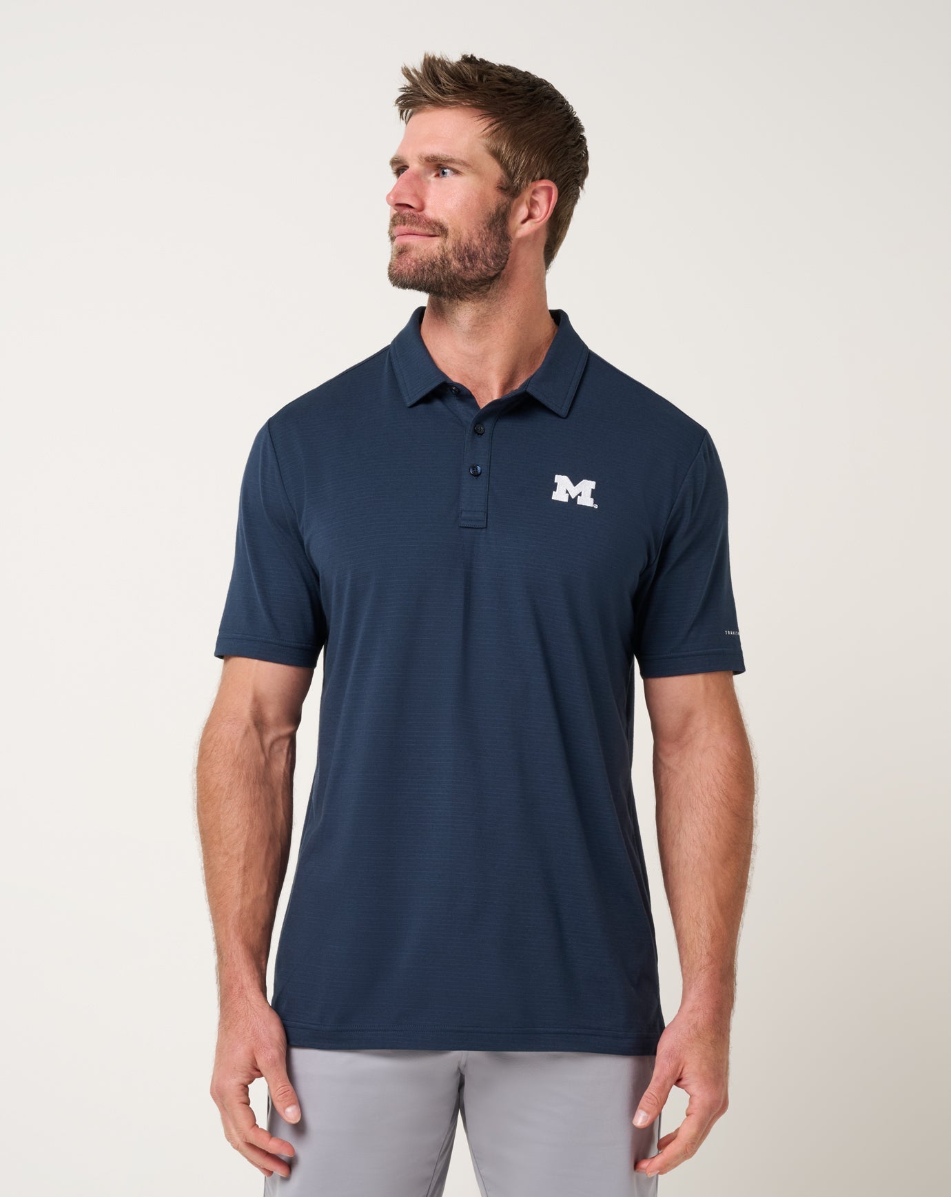 חולצת גולף TravisMathew Michigan Halftime Show Heater Polo